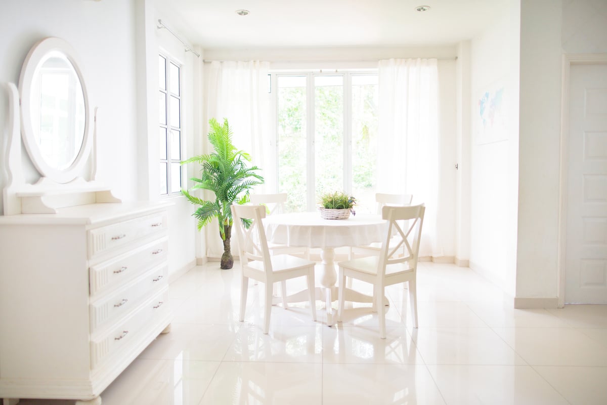 Home interior. Dinning room. Table and chairs.